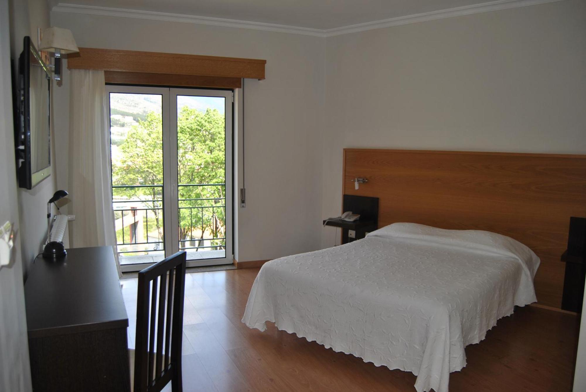 Hotel Covilhã Jardim Quarto foto